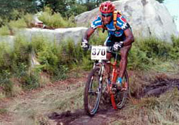 Racing a Fuji MTB on a downhill trail.